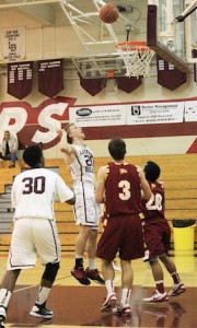 Senior Cole Kesler floats in two of his game-high 21 points against Estancia last Friday at Dugger Gym.