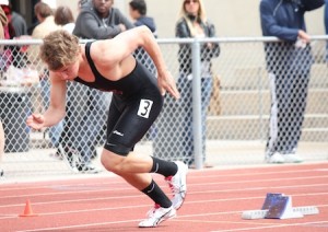 Senior Reece Barton fires out of the blocks at the start of the 400m.