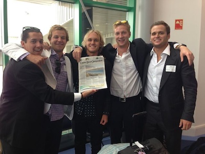 From left: Rex Miller and Dylan McDonald, of Laguna Beach; Cole Moody of Laguna Niguel; Robbie McKnight, also of Laguna; and JB Green of Newport Beach; with their hometown paper before their next adventure.  