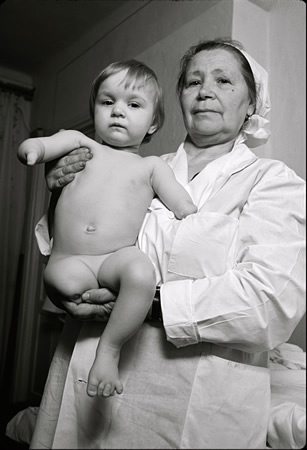 Photographer James Lerager likened his image of a child born with birth defects after the 1986 Chernobyl disaster to Madonna and child iconography, but with a horrible modern twist. His work is in the BC Space show.