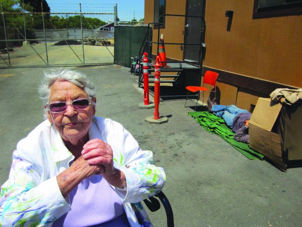 Friendship Shelter supporter Jean Raun outside the city’s homeless shelter in Laguna Canyon and location of the organization’s proposed supportive housing project. 