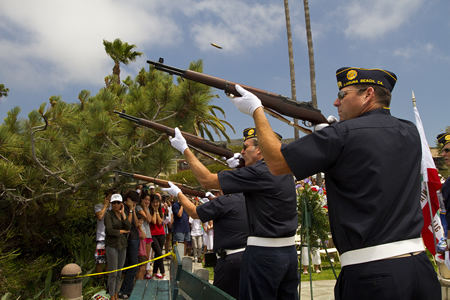 A rifle detail fires a 21-gun salute during Memorial Day ceremonies to honor 1.3 million people who have died in U.S. military service. 