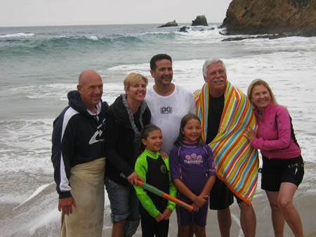 Pastor Gene Molway, second from right, with wife Kenette, far right, baptize a church family at Crescent Bay. Photos courtesy of Salt Church.