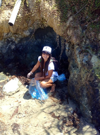 Erin Miyawaki, a past participant, on the hunt for trash.