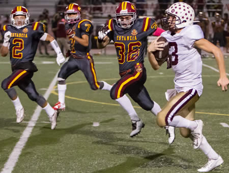 Sophomore running back, Bruce Knill, ran for 63 yards on six carries.  He broke this 23 yard run only to be pounce on be three Estancia players.  Knill suffered an injury on the play ending his season.