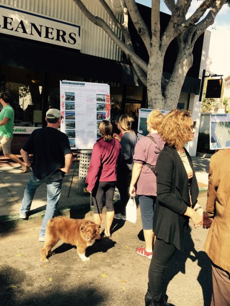 Those interested in re-imagining Laguna Beach’s downtown stop by an outdoor workshop on Ocean Avenue. Photo by Jennifer Erickson 
