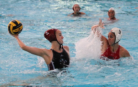 : Makenzie Fischer winds up for one of her seven goals during Laguna's 21-2 thrashing of King (Riverside) on Tuesday, Dec. 16 at the home pool. 
