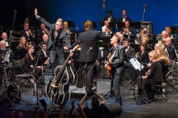 Laguna Concert Band featuring Stray Cat Lee Rocker, seen here performing with Buzz Campbell, return to the the Laguna Playhouse Saturday and Sunday, at 7 and 3 p.m., respectively.    Photo by Stan Sholik