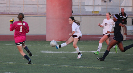 Junior midfielder Chiara Noppenberger catches the goalie out of position and punches the ball past her for Laguna’s only goal in their 3-1 loss to Sierra Canyon in the CIF quarter final on Thursday, Feb. 26, at Guyer Field.