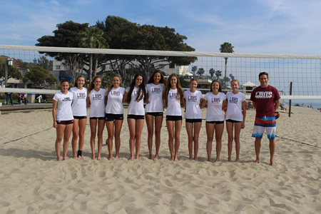 Breakers second season of girls sand volleyball opened on Saturday, March 14, at Huntington Beach where Laguna defeated Edison 2-1 and swept Marina 3-0. Players from left, Summer Dvorak, Kendyl Brennan, Lauren LaMontagne, Briana Boyd, Lexi McKeown, Cammie Dorn, Kelsey Paul, Olivia Hockaday, Katelyn Carballo, Claire Hockaday and Coach Raul Papaleo. Not pictured: Sabrina Stillwell and Sage Patchell.  Photo courtesy of Laguna Beach High School.