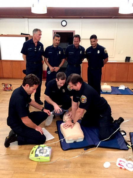 Station 11 reserve firefighters practice their CPR skills; from left standing, Joe Emley, Ali Izadpanah, David Skarman and Harry Gahagen; front, Brennan Slavic, John Mullee and Darren Trudeau.   