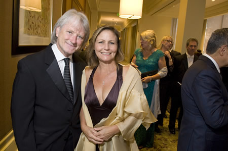 Maestro Carl St.Clair, here with wife Susan, led a champagne toast to the musicians who make such an event possible.