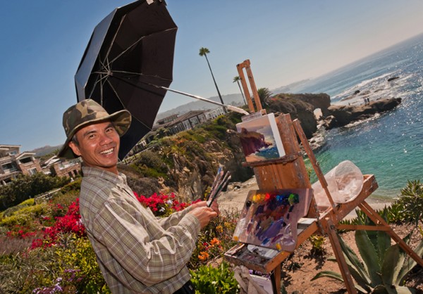 Michael Situ paints at Montage Treasure Island Park during a recent contest.