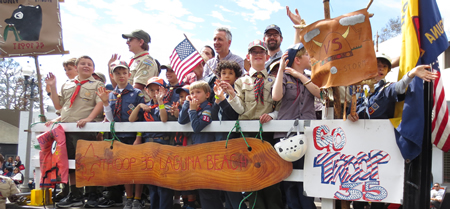 Boy Scouts and Cub Scouts of America made their way in a hand-designed float. 