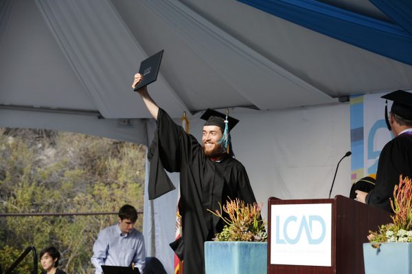 Bradford James Smith celebrates receiving his graduate degree in painting and drawing.