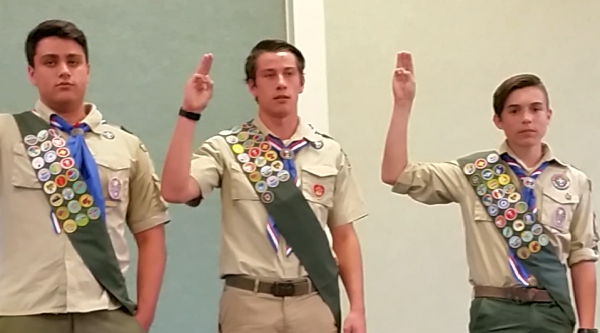 Grant Miller, Bobby Briggs and Jack Reed taking the oath to become an Eagle Scout.