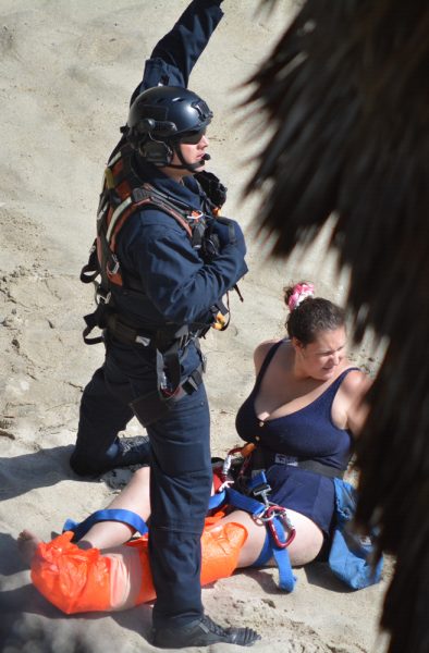 Due to a swiftly rising tide, rescuers airlifted out a woman who suffered an ankle injury from Tablerock Beach about 3 p.m. Monday, May 30. She was with three minors, who needed transportation.