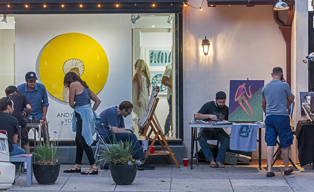 Artists Republic introduced its “Pageant of the Vandals” exhibition with a demonstration by street artists during Art Walk. Photo by Mitch Ridder