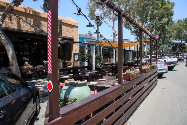 Chef Alessando Pirozzi’s experimental parklet on Forest Avenue will be dismantled shortly; he had to take down the patio cover early and thus drew no takers midday. Photo by Jody Tiongco.