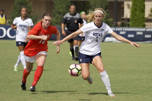 Former Laguna Beach player Marina Paul, right, in action for Georgetown. 
