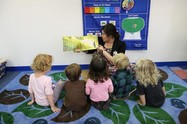 Sandee Bandettini joins story time at the Boys and Girls Club preschool.