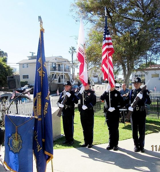 The presence of the police color guard adds formality to the Veterans Day ceremony. Photo courtesy of American Legion.
