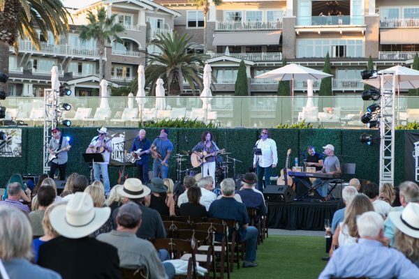 The 133 band, jam-packed with local talent and playing at an outdoor concert last month, performs Monday, Nov. 7, at 8 p.m., Mozambique restaurant, 1740 S. Coast Hwy, 949 715-7777. Photo by Jim Collins. 