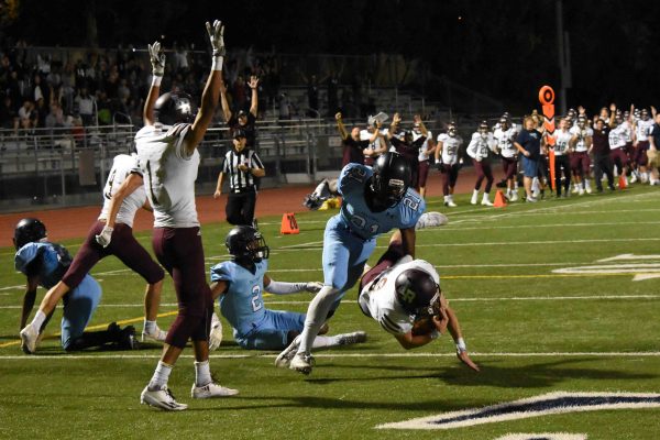 Bruce Knill crosses into the end zone in the Breakers playoff win 26-21 against the Duarte Eagles Friday, Nov. 11. Check back for more details.