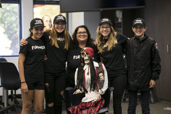  Teacher Michelle Martinez, center, and her class mascot, with students, from left, Leah West, Faith Ackley, Sophia Lander and Taylor Viloria.  