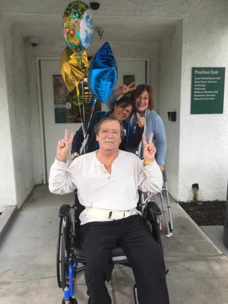 John Barber leaves Mission Hospital in Mission Viejo with his wife Becky and discharge attendant Maria after a three-week recovery from an accident. 