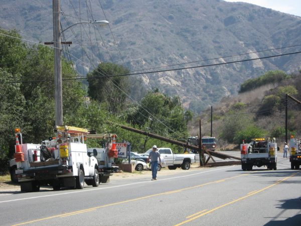 : City officials commit to a multi-million dollar effort to rid the town of above ground utility poles, which ignite fires and often halt traffic. 
