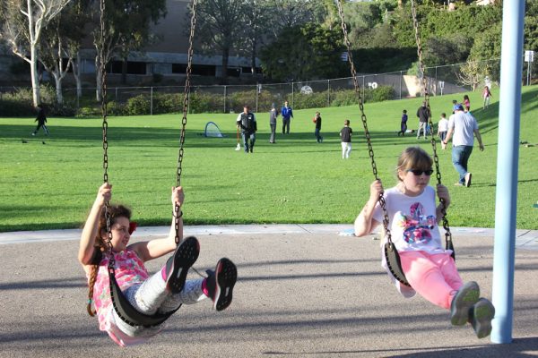 Members of the Boys and Girls Club’s canyon and Lang branch enjoy spring-like temperatures during the winter break. The city is starting to explore adding a pool to the Lang Park field.Photo by Andrea Adelson.