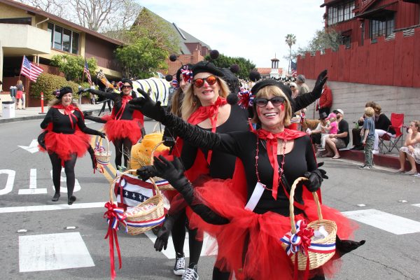 Amy Jackson, left, and Pam Wicks, right, add color to the 2016 parade. This year's sets out on Saturday, March 4, on Park Avenue.