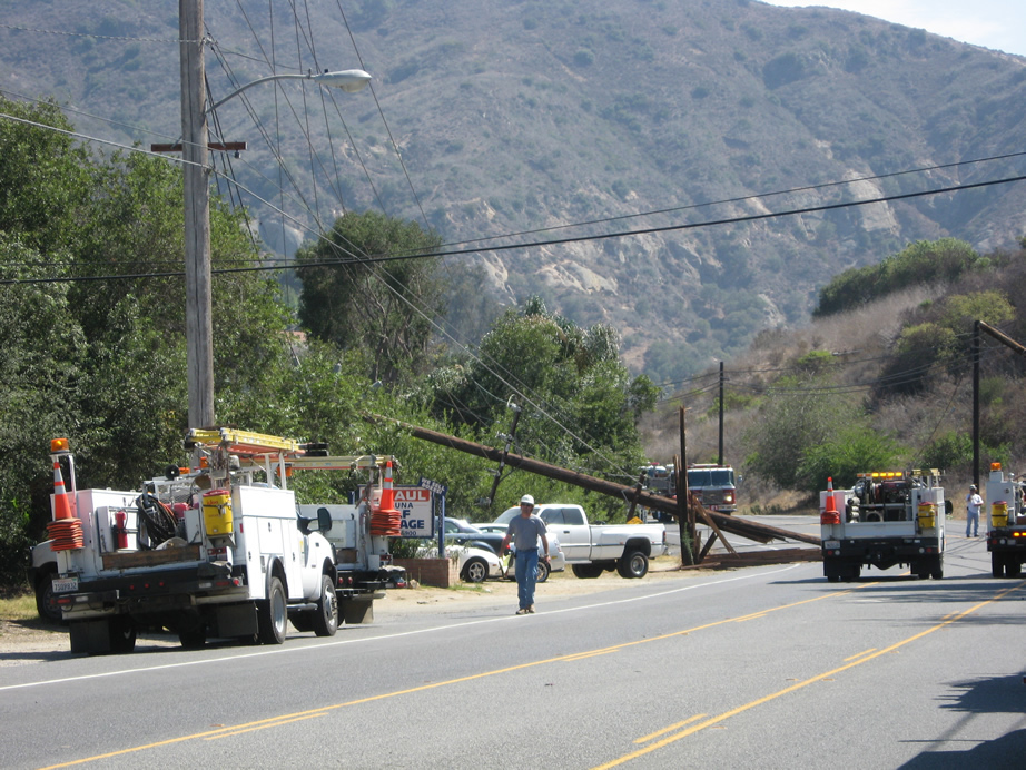 City officials continue to press utilities to underground their overhead lines, which routinely are pulled down to block and congest Laguna Canyon and spark occasional fires. Photo courtesy of the city of Laguna Beach. 