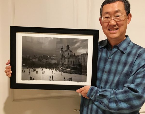 Andrew Ko’s Prague town square photo is part of the City Hall exhibit.