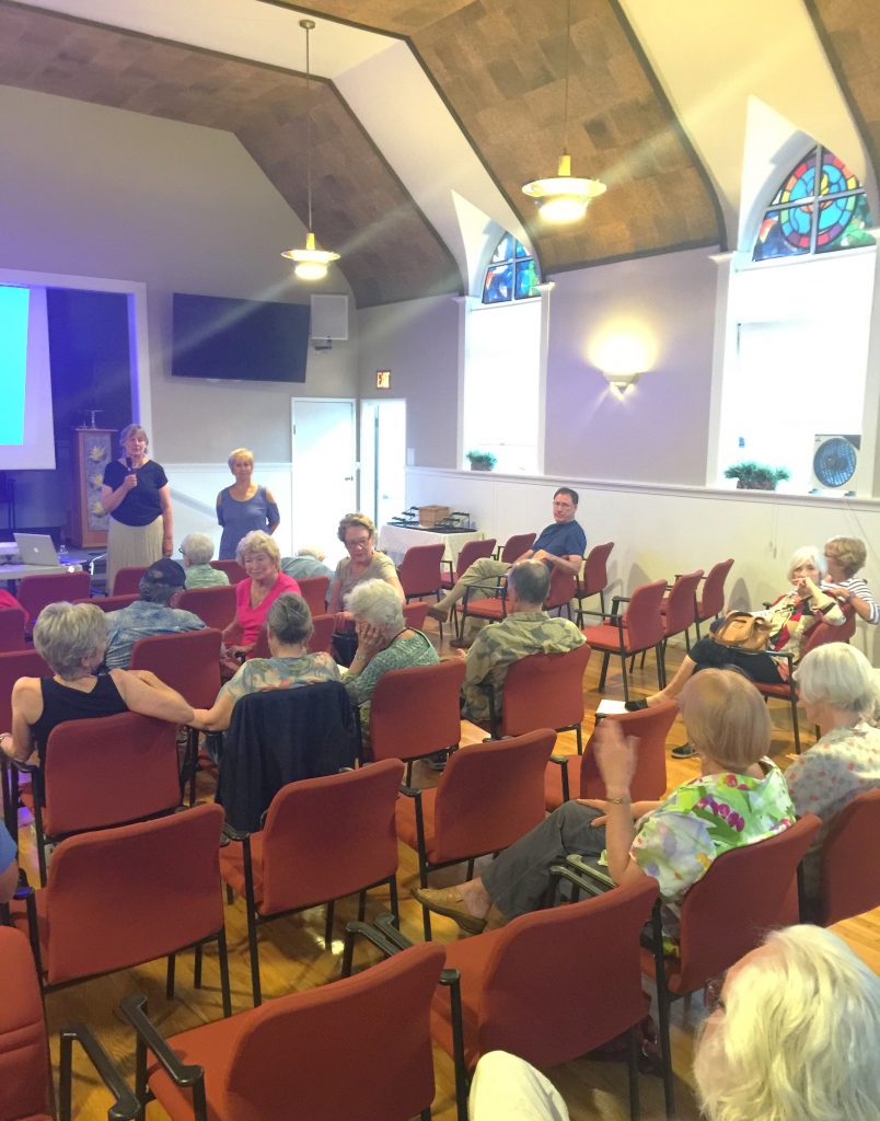 At a recent Village Laguna meeting, Ann Christoph explains the impact of possible changes to the city's  historic preservation rules. 