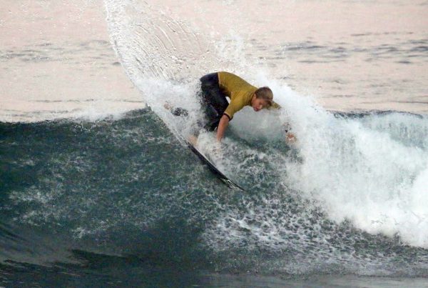 Kiko Nelsen rides a wave