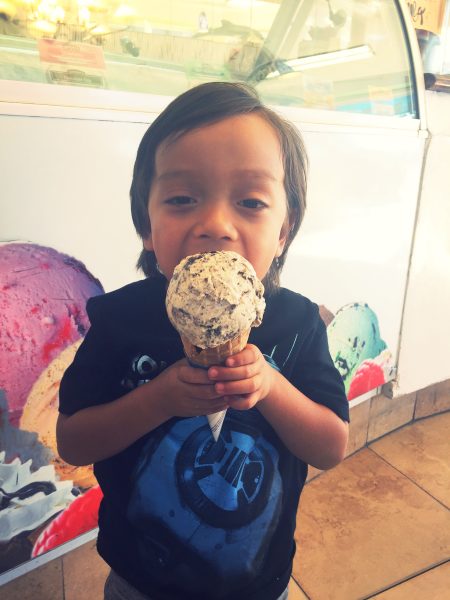 Luke Hernandez, 3 cools off with ice cream at Chantilly's in downtown Laguna. Photo by Cassie Walder.