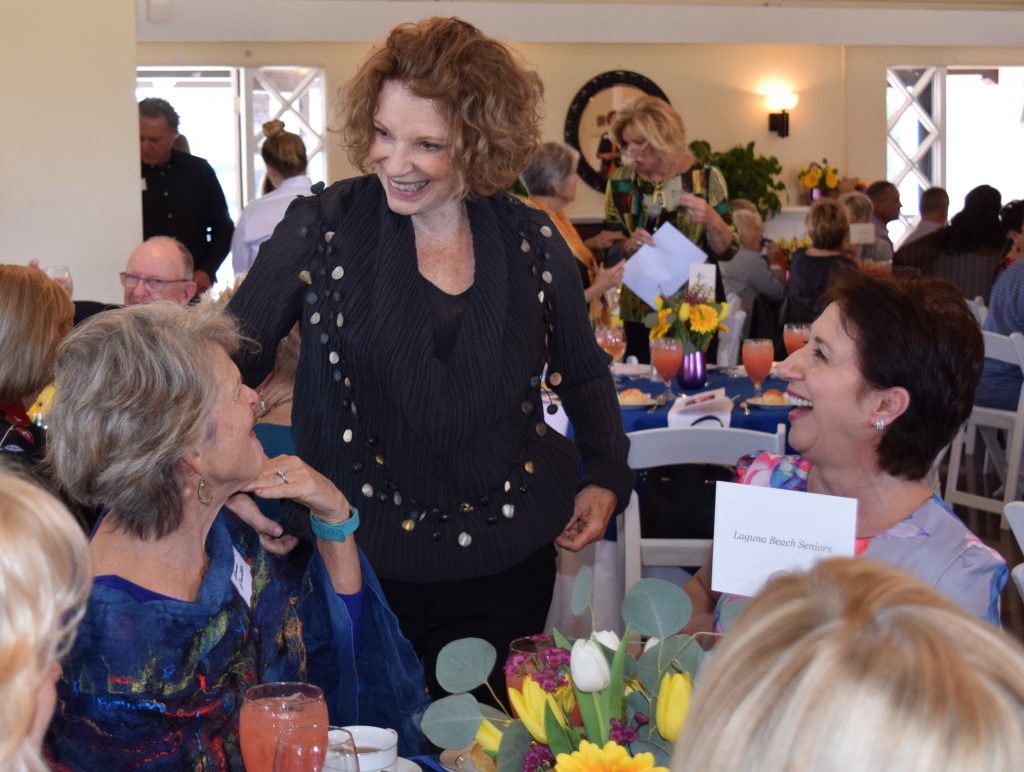 Former Mayor Toni Iseman, center, greets Ann Quilter and Nadia Babayi. Photo courtesy of the Woman’s Club 