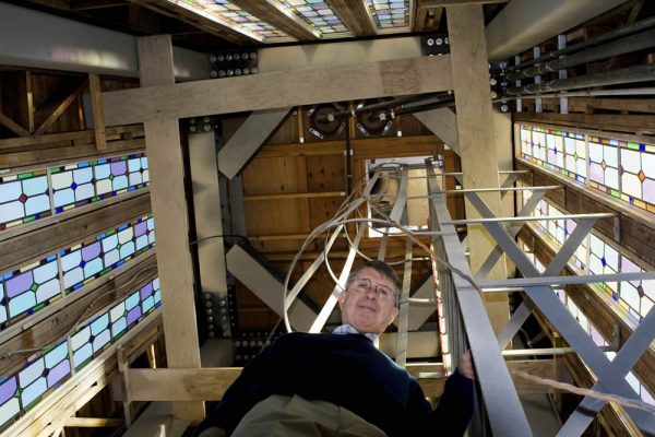 Senior Pastor Jerry Tankersley inside the renovated church belltower. Photo by Ted Reckas.