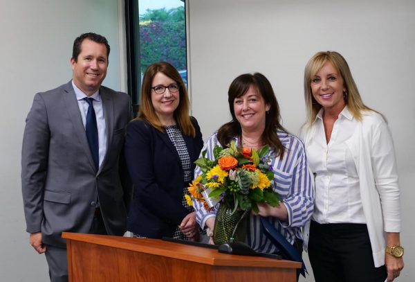 Teacher of the year Laura Silver, second from right, with administrators, from left, Jason Viloria, Leisa Winston and Thurston principal Jenny Salberg.