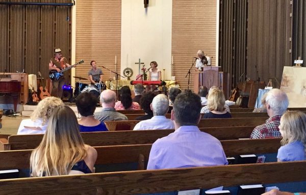 The local band Moon Police rocked the sanctuary during Neighborhood Church’s first peace and justice weekend of workshops. 