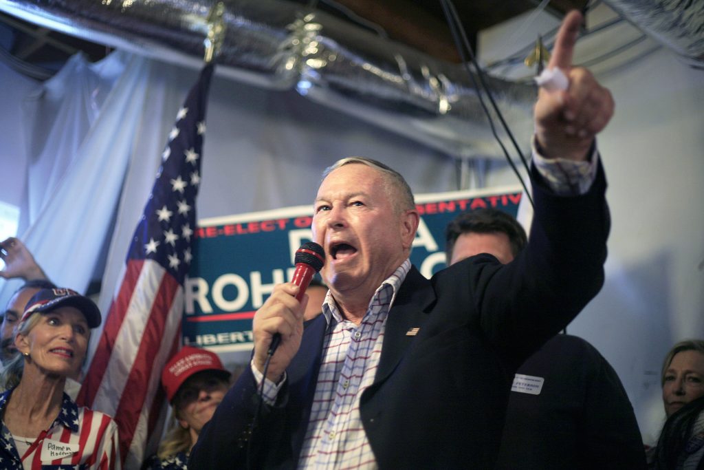 Republican incumbent Dana Rohrabacher gives a speech in front of an excited crowd during a primary election night event at his campaign headquarters in Costa Mesa on Tuesday. — Photo by Sara Hall ©